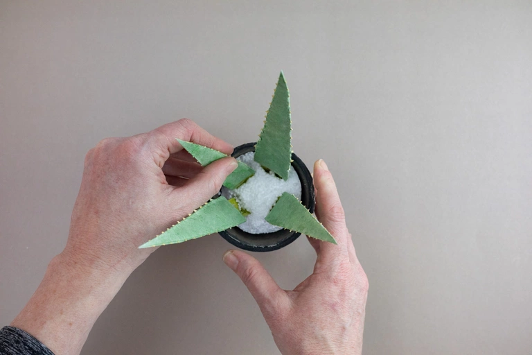 This aloe is handcrafted using cardstock.