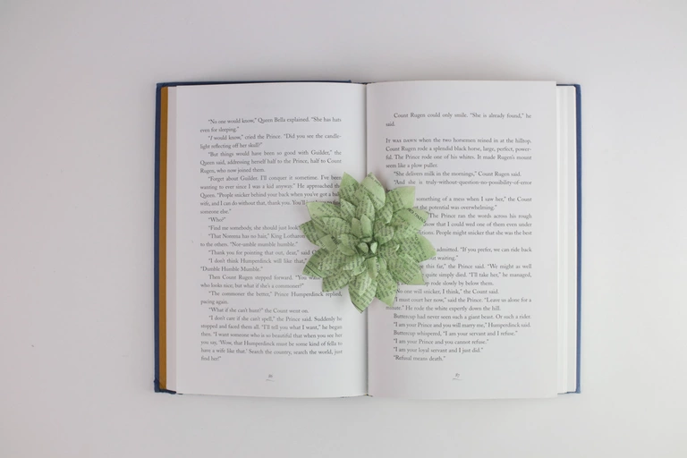 Paper succulent made from book pages.